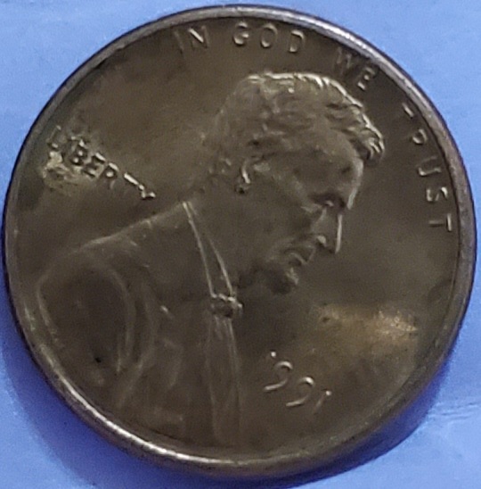 1991-Penny-With-A-Risen-Line-On-Reverse-Side.-I-Tried-To-Get-Better-Pictures-And-Different-Angles